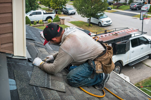 Professional Gutter Repair And Installation technician working in Lakeville, MA